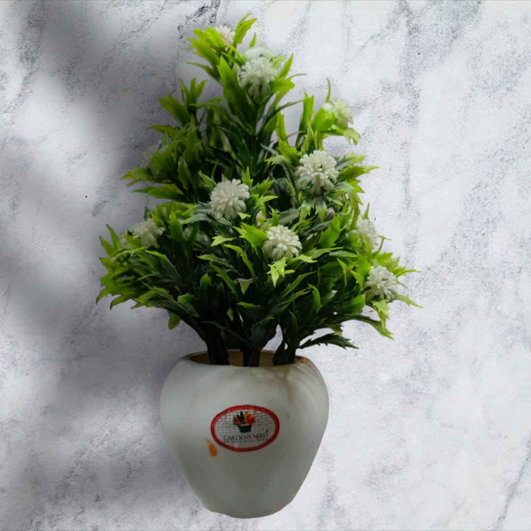 "Elegant 5-Inch Green Leaves Plant in White Base: Timeless Simplicity"