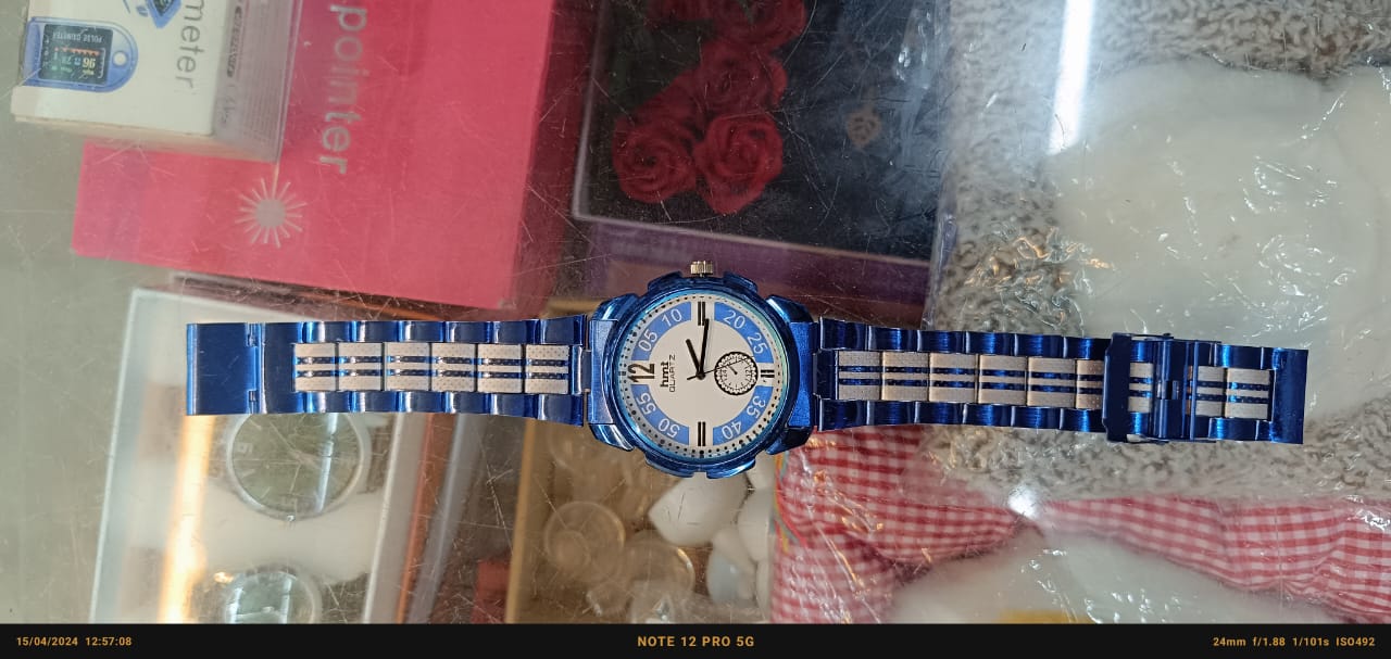 HMT Azure Horizon: Round Dial Watch with Adjustable Strap"