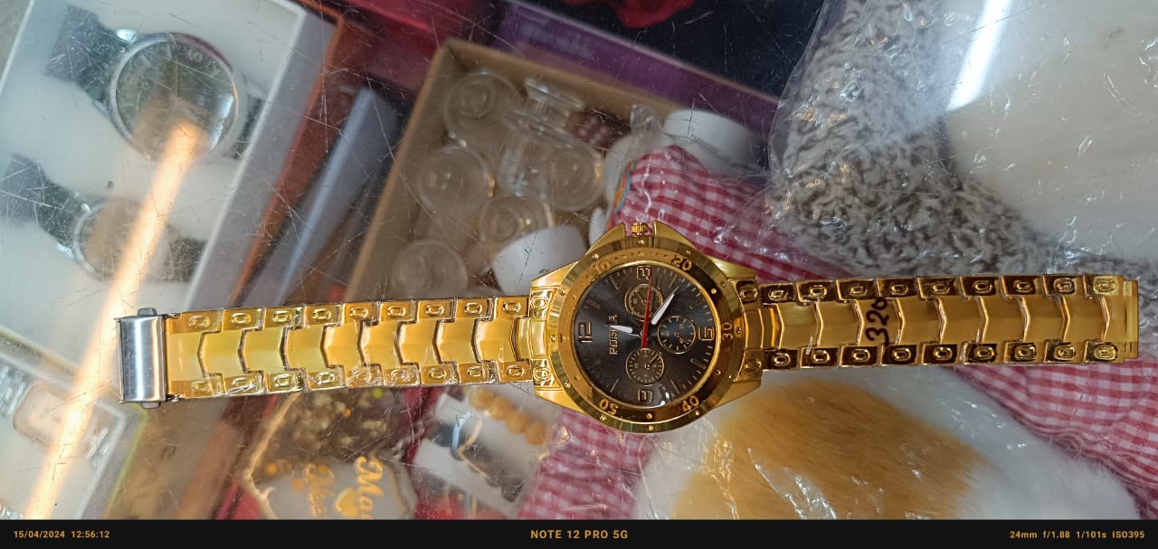 "Golden Elegance: Round Dial Chain Watch" Description: "Embrace timeless sophistication with this exquisite golden chain watch featuring a beautifully crafted round dial. Elevate your style with this classic accessory, perfect for any occas